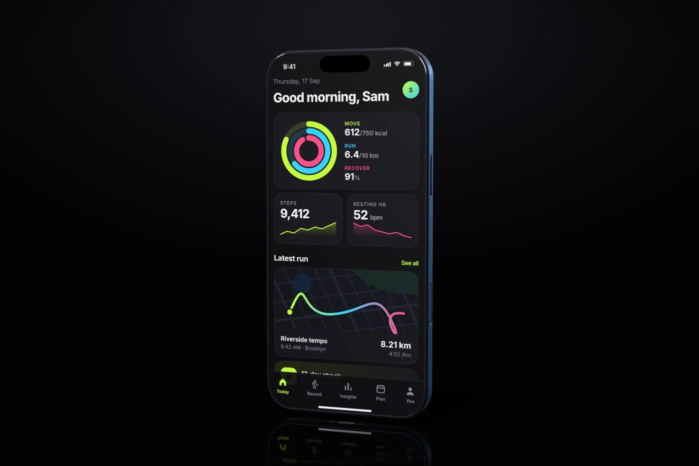 A 3D device mockup of the sample app in the noir theme.
